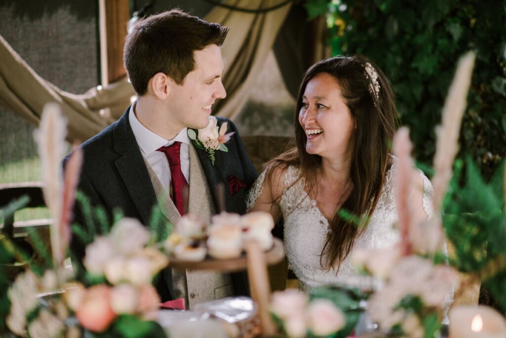 a couple sit and chat during their elopement