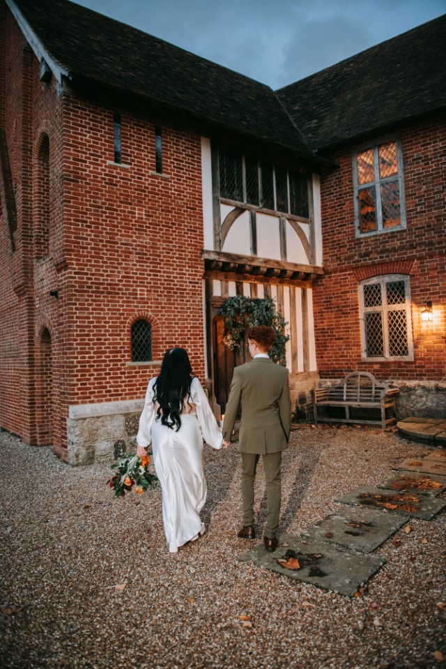 Couple walking at twilight