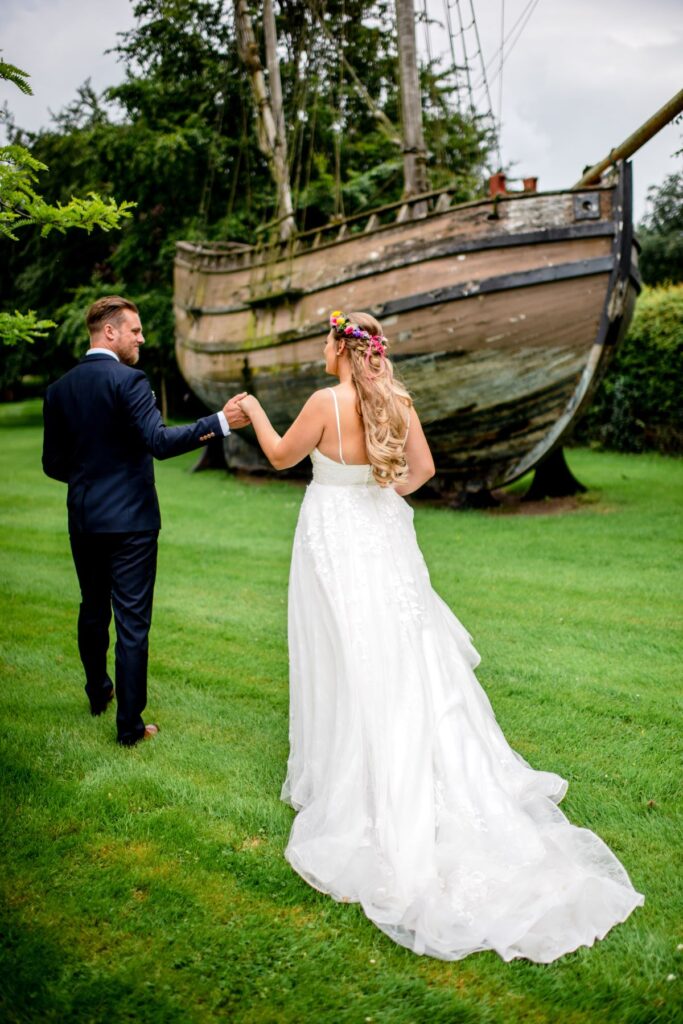 Kirsty and Steve's real elopement at the Castle Westenhanger in Kent by team E-Lope. Couple shots in front of Replica of Discovery