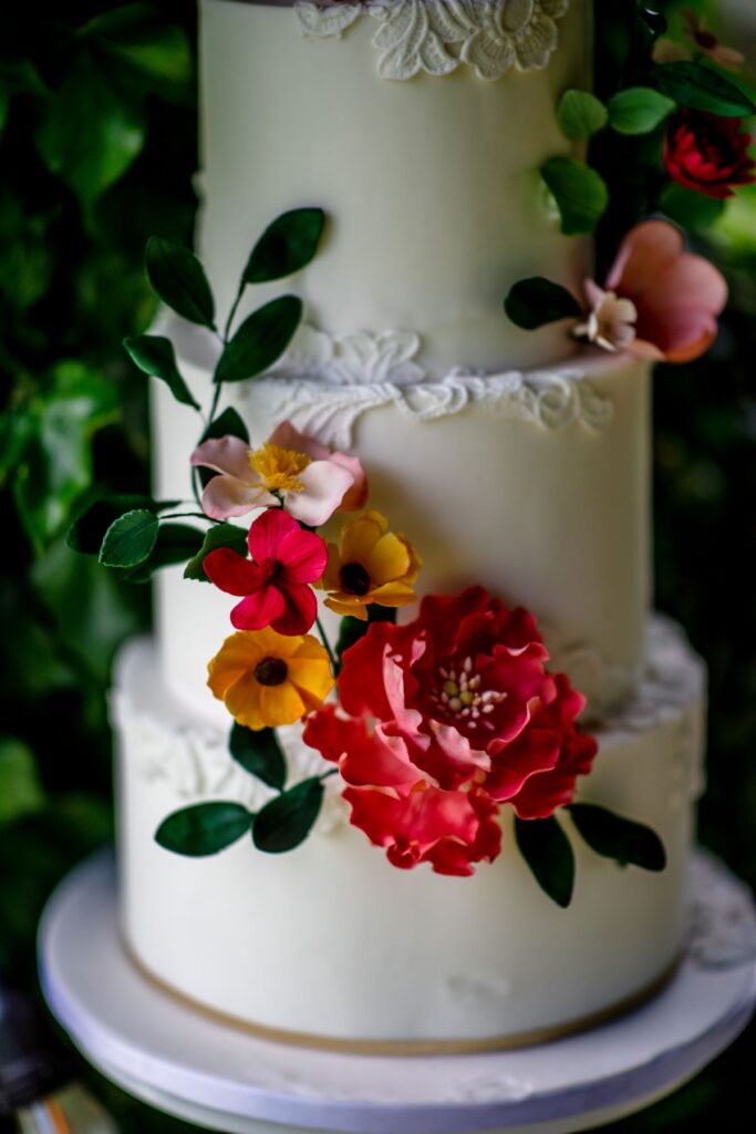 Kirsty and Steve's real elopement at the Castle Westenhanger in Kent by team E-Lope. A wedding cake with sugar flowers by Cobi and Coco