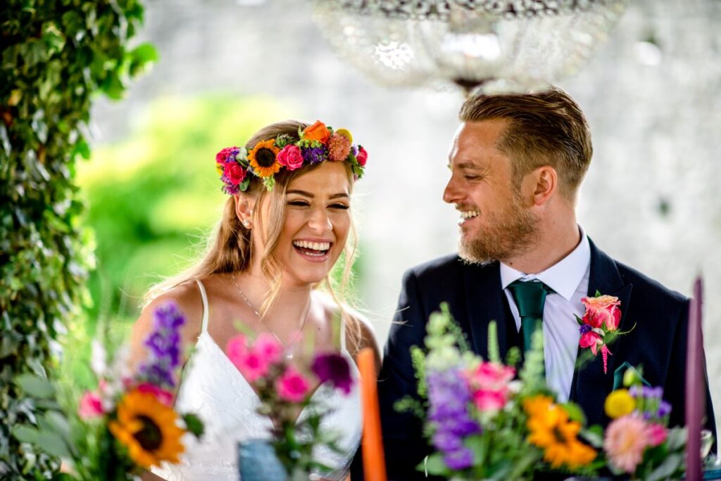 Kirsty and Steve's real elopement at the Castle Westenhanger in Kent by team E-Lope. The tiny gathering dine alfresco under the thatched gazebo