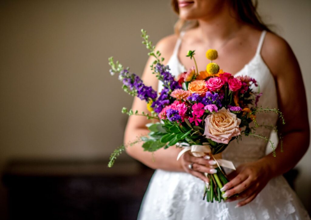 Kirsty and Steve's real elopement at the Castle Westenhanger in Kent by team E-Lope. Kirstys brightly coloured bouquet