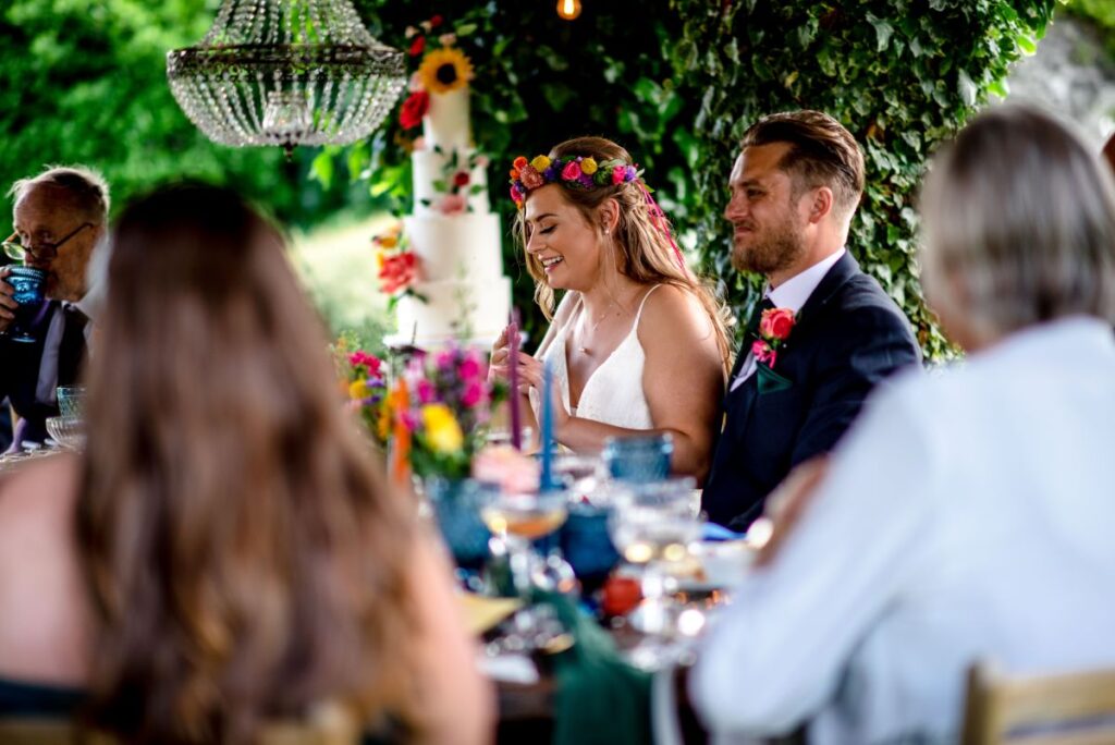 Kirsty and Steve's real elopement at the Castle Westenhanger in Kent by team E-Lope. The tiny gathering dine alfresco under the thatched gazebo