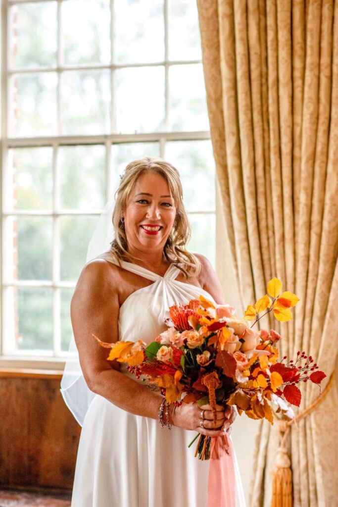 A halloween inspired bouquet for an elopement at the Castle Westenhanger Kent England