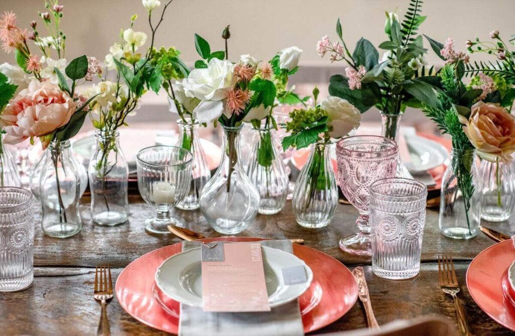 A pink tablescape for Aidan and Rachels tiny wedding at the Castle Westenhanger, Kent, England