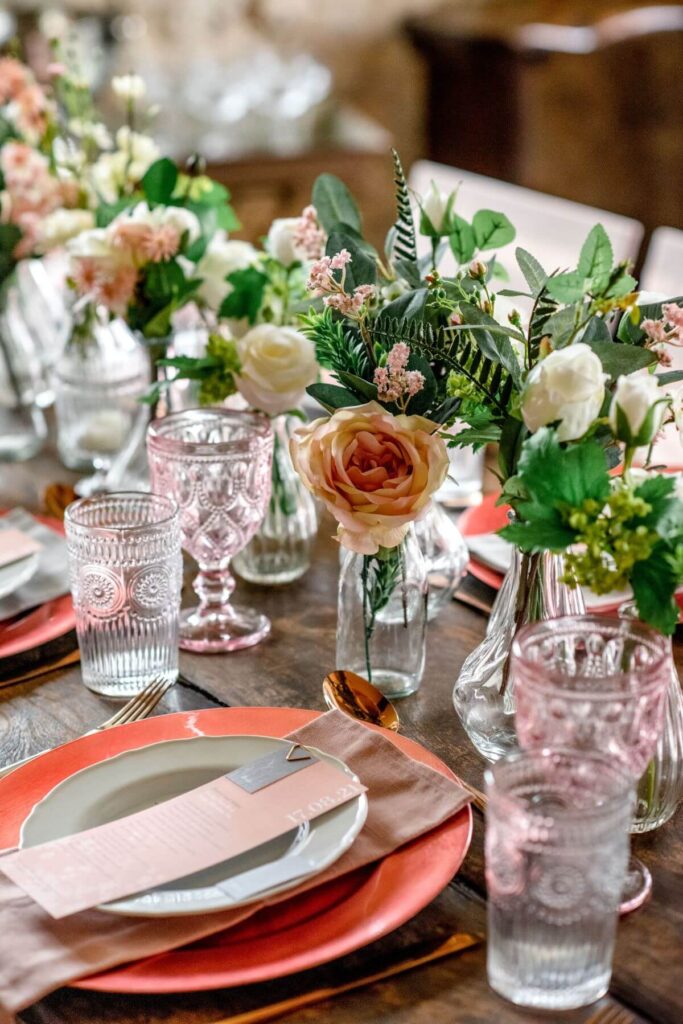 A pink tablescape for Aidan and Rachels tiny wedding at the Castle Westenhanger, Kent, England
