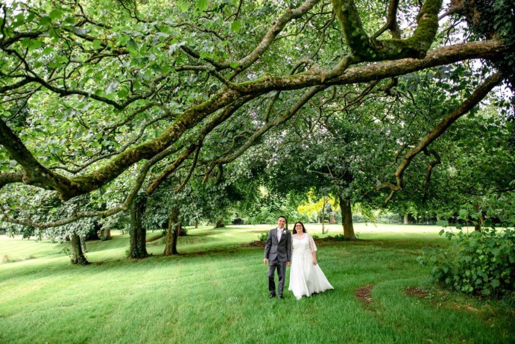 The eloping couple enjoy their couple shoots in the grounds of the castle westenhanger, kent, England