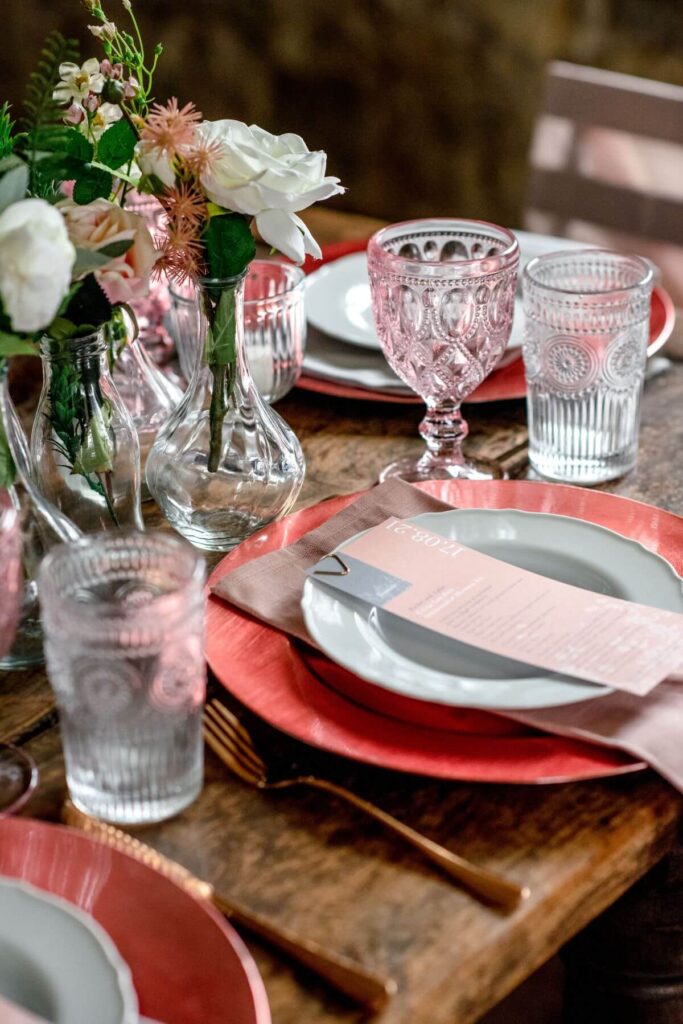 A pink tablescape for Aidan and Rachels tiny wedding at the Castle Westenhanger, Kent, England