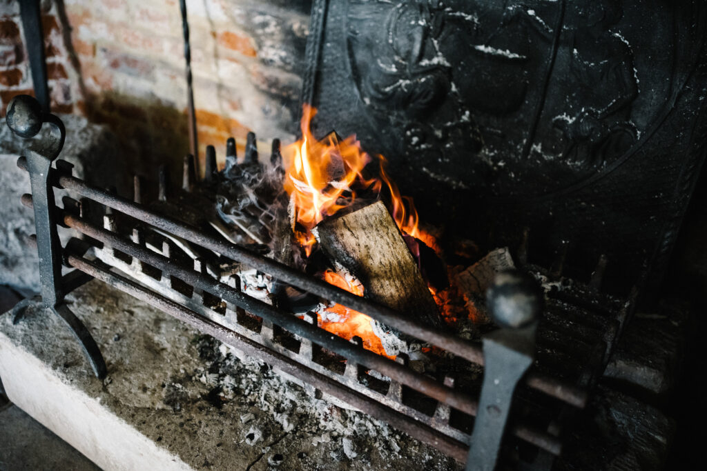 A fire welcomes the couple for their afternoon tea in the Castle Westenhanger kent, England