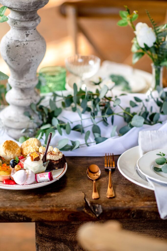 A tablescape set up for an elopement afternoon tea at the Castle Westenhanger in Kent, England