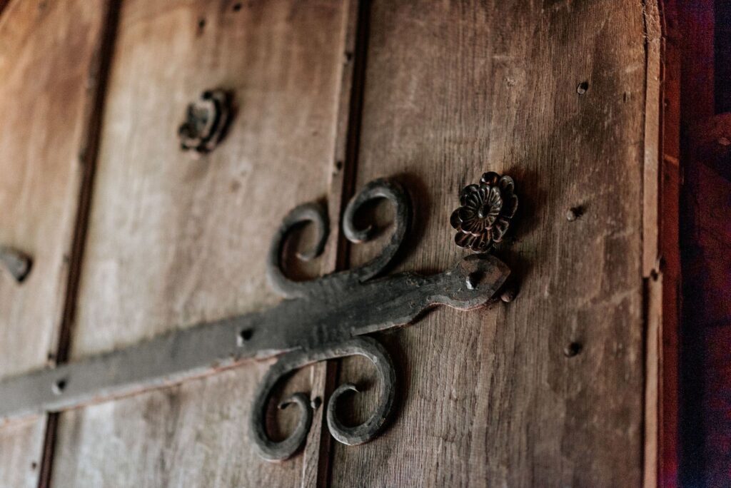 The Lost Village of Dode in Gavesend, Kent, abandoned over 600 years is perfect for an elopement - The front oak door with iron work