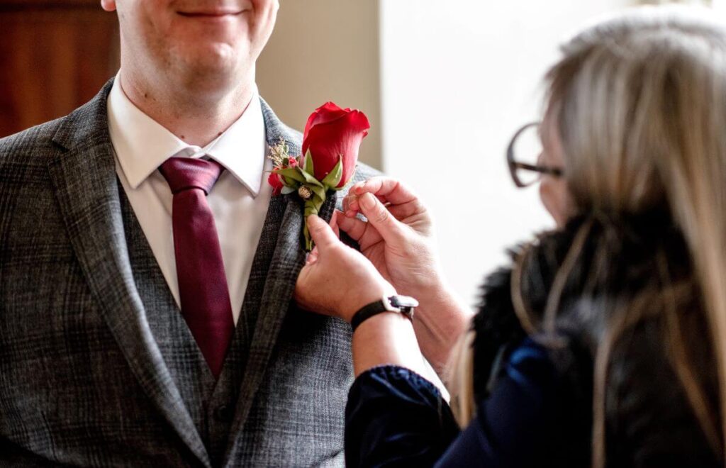 Emma and Paul's purple and red elopement with birds of prey at the Castle Westenhanger in Kent