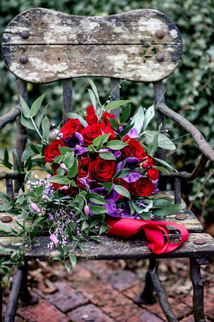 Emma and Paul's purple and red elopement with birds of prey at the Castle Westenhanger in Kent
