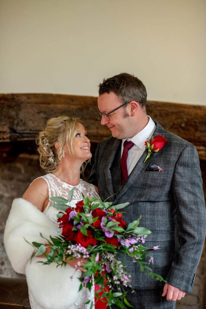 Emma and Paul's purple and red elopement with birds of prey at the Castle Westenhanger in Kent