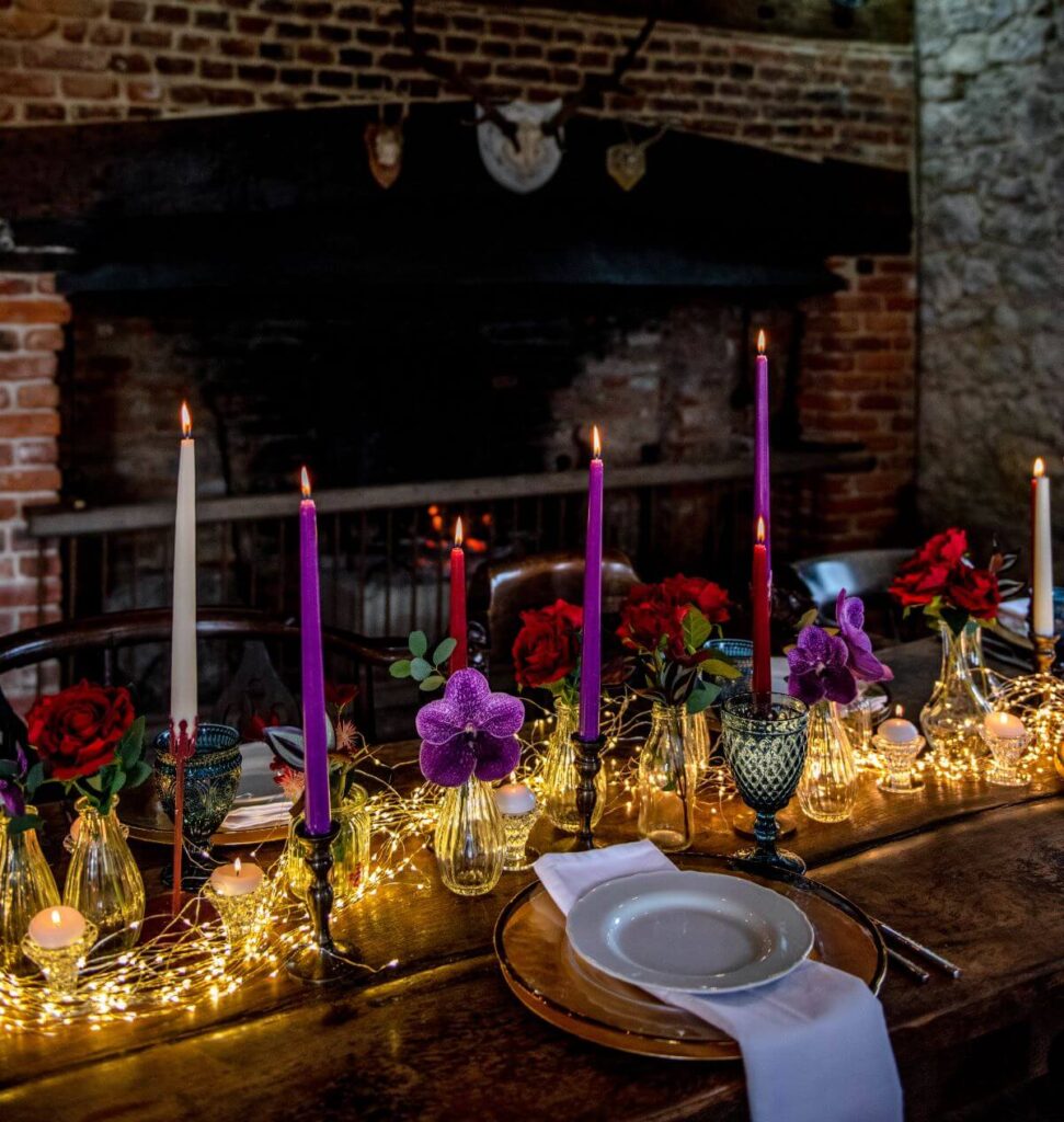 Emma and Paul's purple and red elopement with birds of prey at the Castle Westenhanger in Kent