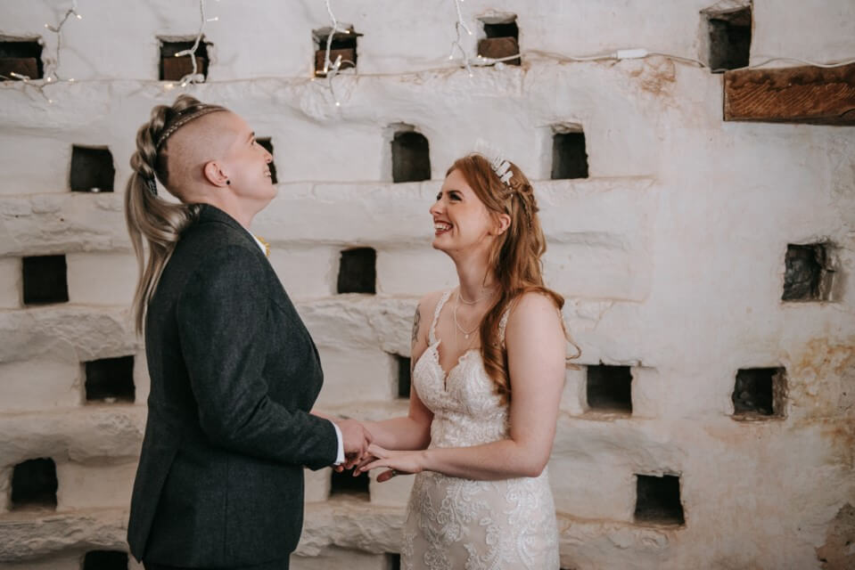 A couple say I do Inside the Dovecote of the Castle Westenhanger in Kent licenced for elopements, tiny and petite weddings