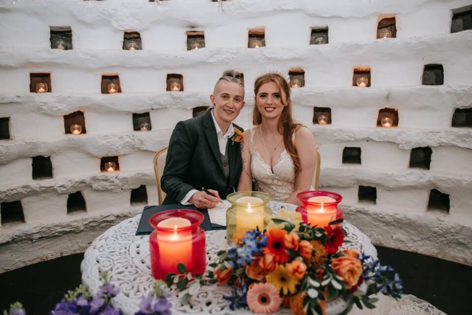 A couple say I do Inside the Dovecote of the Castle Westenhanger in Kent licenced for elopements, tiny and petite weddings