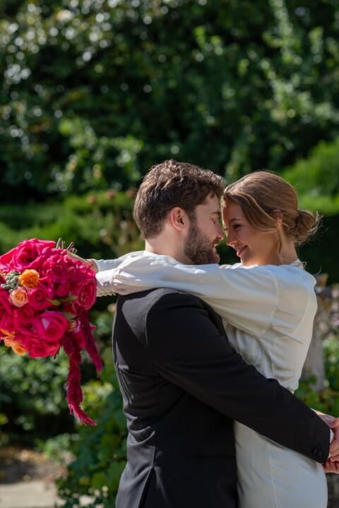 The bride and groom on the Trojan Steps of the Mansion at Port Lympne, Kent, England after their luxury elopement with team E-Lope
