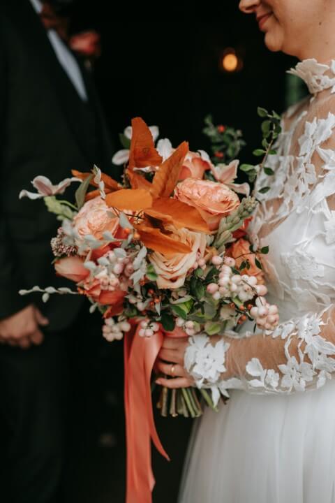 An autumn bouquet prepared by Ruth of House of Mimi Fleur for an autumn elopement at the Castle Westenhanger, Kent, England